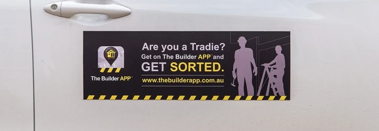 A car magnet advertising an app.