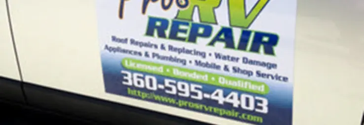A car magnet advertising for a repair company.