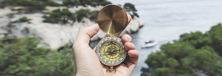 A compass pointing towards north.