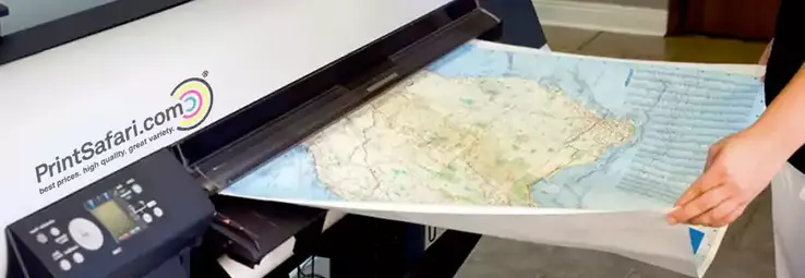 A printer printing a large map.