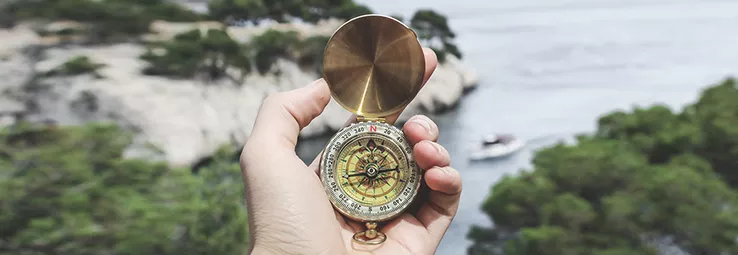 A compass pointing towards north.