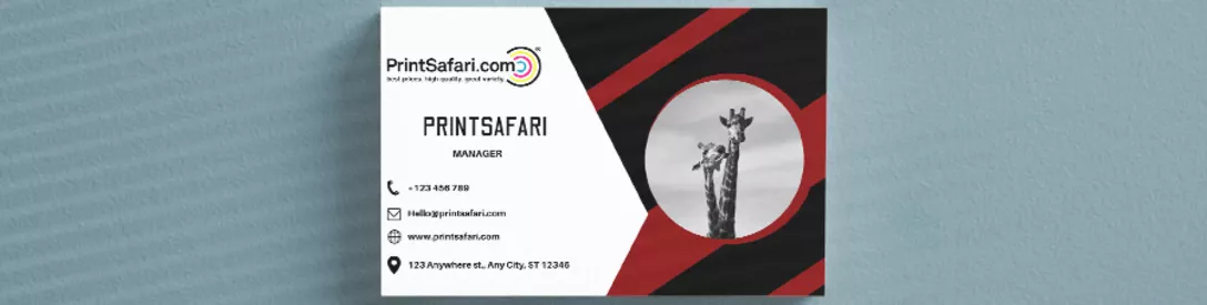 A stylish business card in white, red, and black, featuring the Printsafari logo and the title of the manager, along with an artistic image of two giraffes, symbolizing the brand's connection to wildlife and adventure.