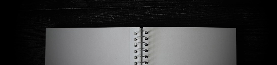 Wire-o booklet on a gray surface.