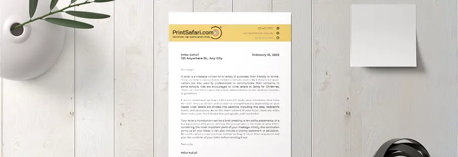 Letterhead from PrintSafari on a table