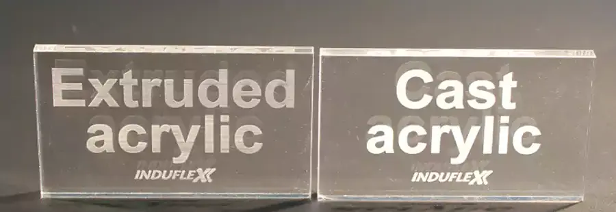 Two acrylic signs displaying the difference between extruded and cast acrylic.