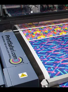 A printer printing textiles.