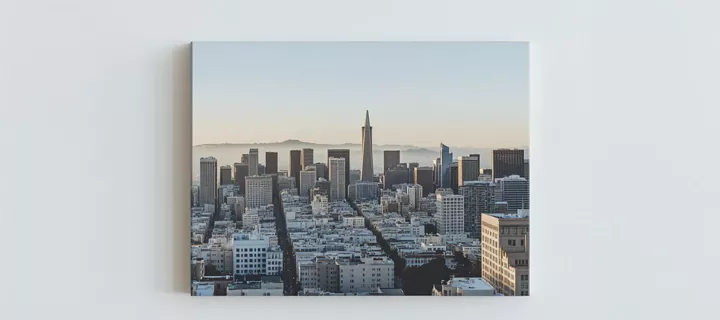 Canvas print of a city skyline at dusk, featuring numerous high-rise buildings under a clear sky.