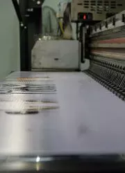 Professional printing press in action.