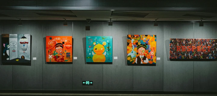 Mounted wall prints hanging at a wall