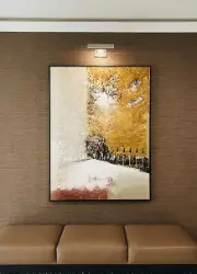 Mounted wall print hanging inside a hallway