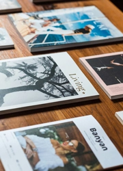 Staggered flyers on a wooden surface