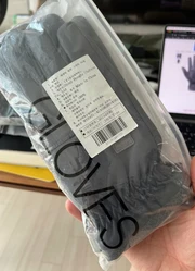 Custom label on the packaging of a pair of gloves