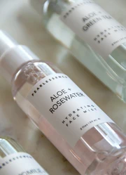 Custom labels sticking on little bottles