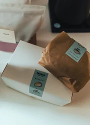 Custom labels put onto packaging of a bakery.