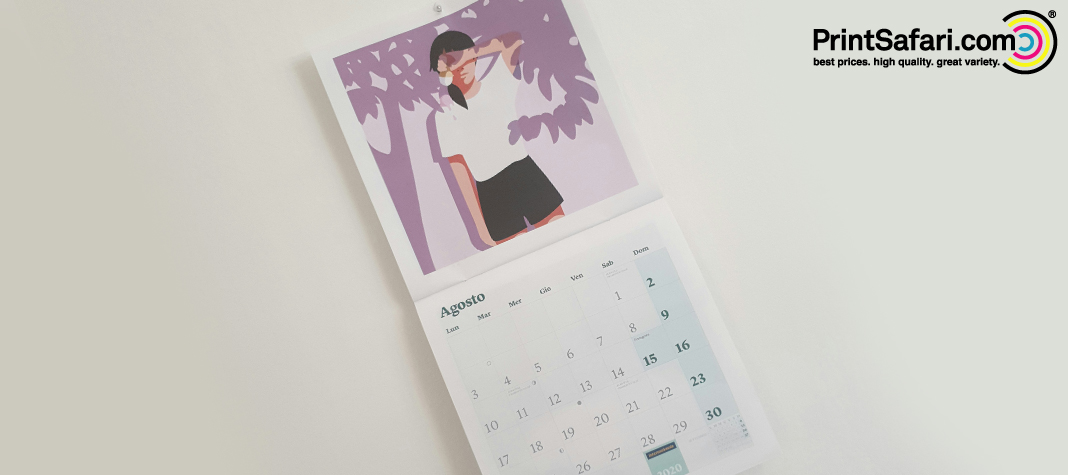 Wall calendar with illustrated artwork and monthly overview, branded with PrintSafari.com logo.