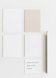 Close-up of a Pantone proof sheet displaying a range of vibrant colors, highlighting the precise color matching and calibration for printing.