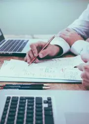 Close-up of a Pantone proof sheet displaying a range of vibrant colors, highlighting the precise color matching and calibration for printing.