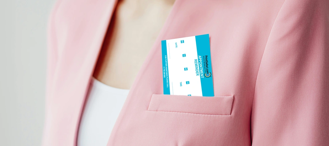 Appointment Card looking out of the pocket of a woman´s jacket