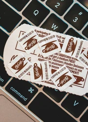 Coupons lying on a keyboard.