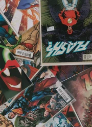 Several comic books scattered on the floor.
