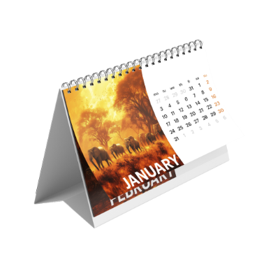 Tent-style desk calendar displaying January with an image of elephants at sunset and bold