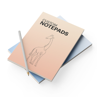 Custom notepad with a soft peach gradient cover featuring a minimalist giraffe illustration and the title 