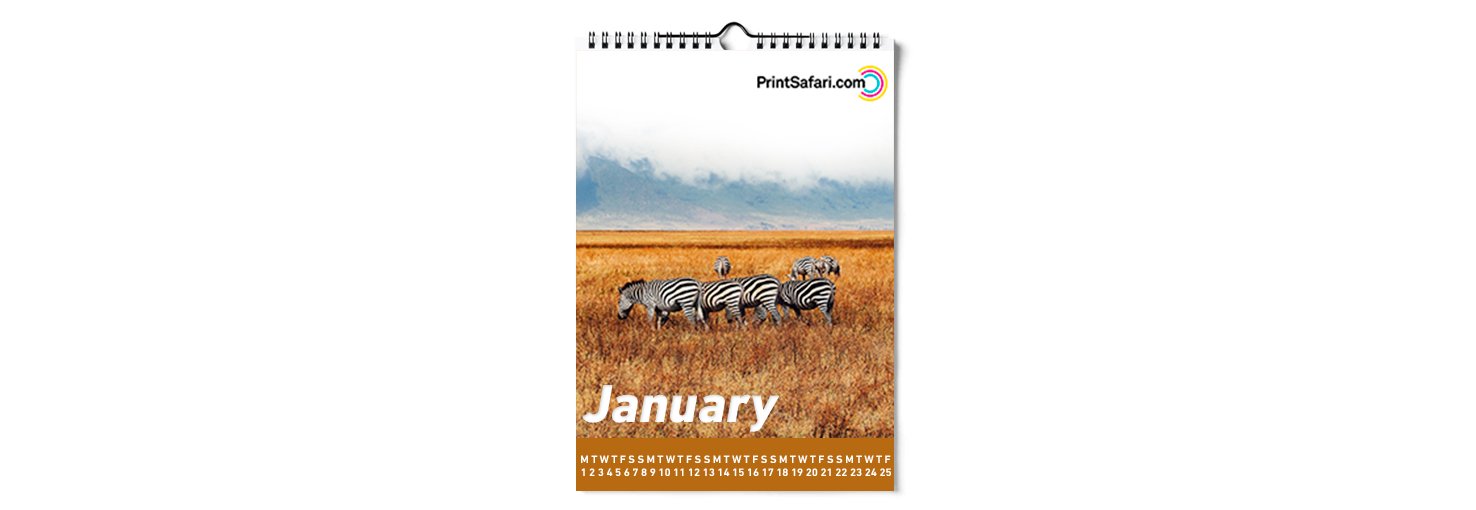 A wire-o calendar featuring zebras in the savannah.